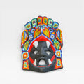 Figuras de Chaquira: Máscara Huichol con colmillos, rostro negro, boca roja y diseños vibrantes.